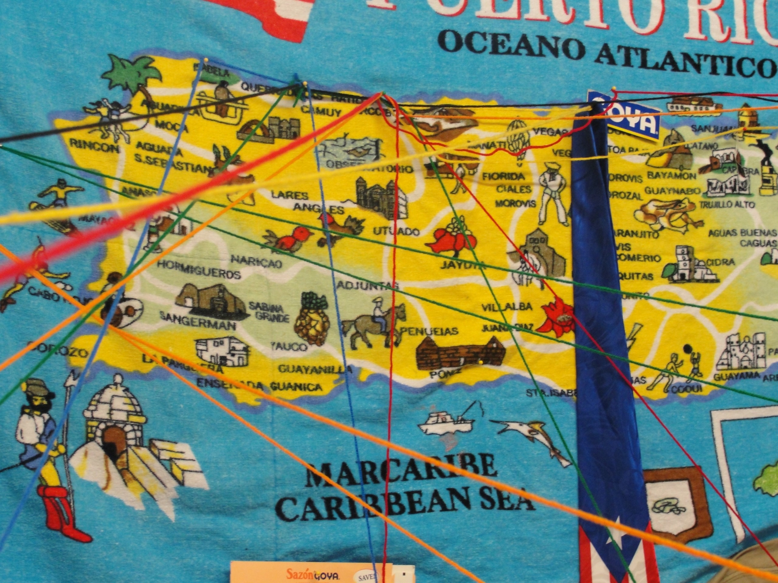 A map of Puerto Rico on a beach towel